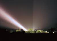 A spotlight shines over the compound. Agents flooded the Davidians with light and blasted the compound with music and noises.(Rick Bowmer/The Associated Press)